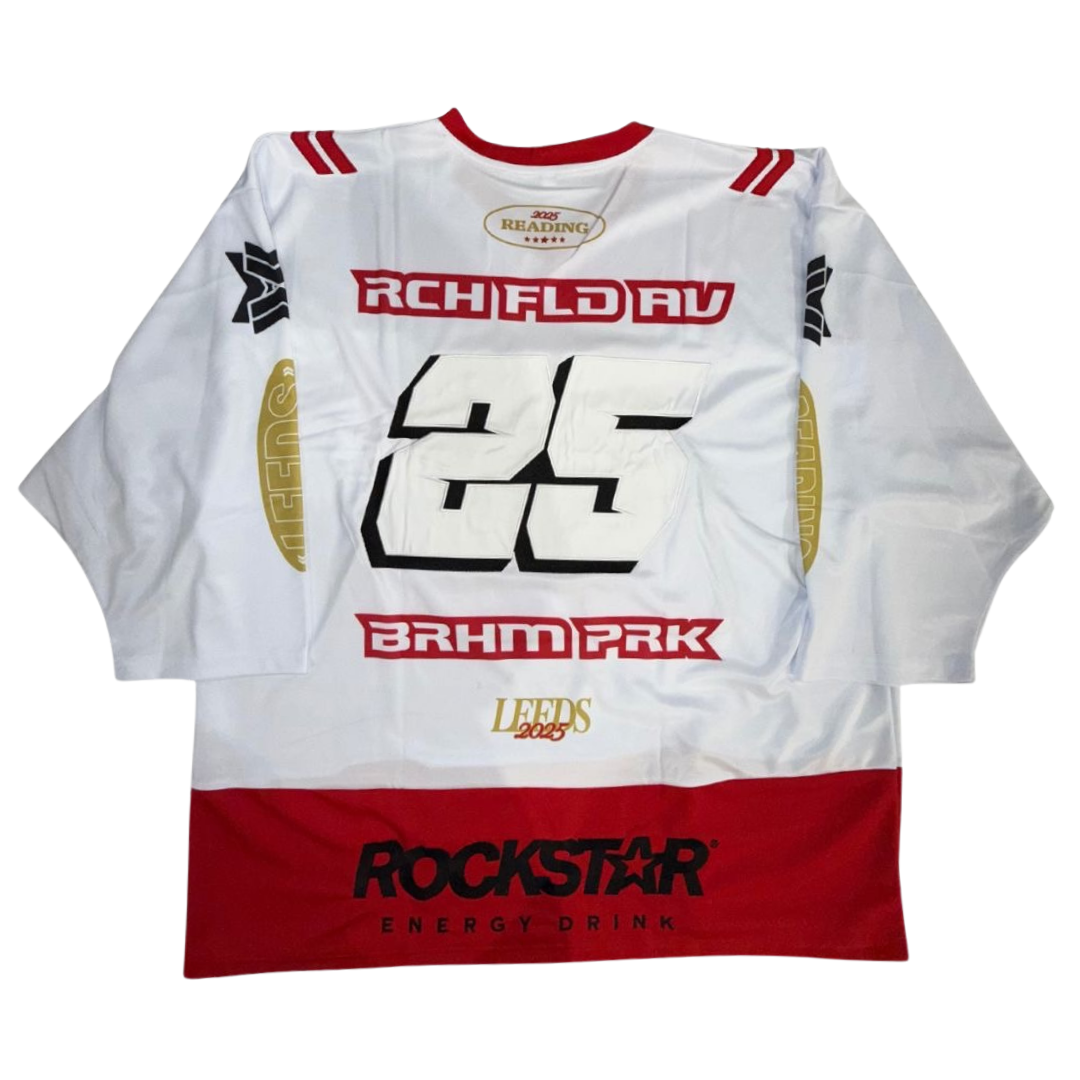 The Oversized Hockey Racer Jersey by 2025 features a white and red design with bold black number 25 on the back and sponsor logos, including ROCKSTAR ENERGY DRINK, on the lower back and upper sections.