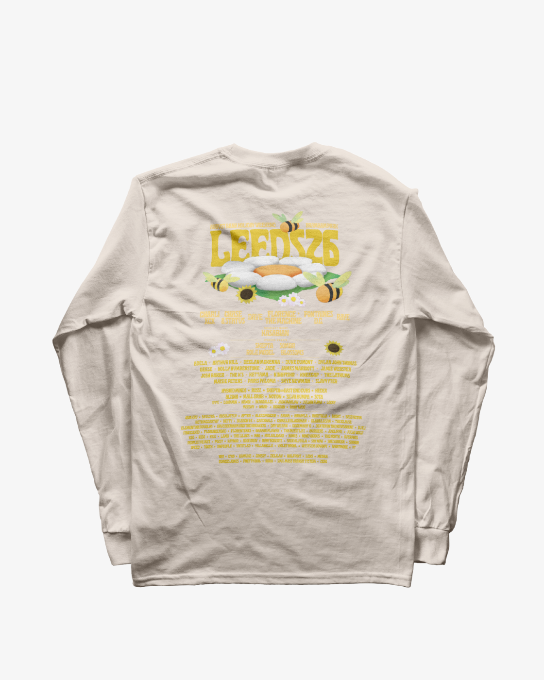 The R&L Click & Collect 2026 “Click & Collect 2026 Leeds Line-Up Long Sleeve” is a cream long-sleeve shirt featuring yellow LEEDS 26 text, clouds, and flowers on the back. Beneath this design, a large list of artists or bands is printed in yellow, evoking a music festival lineup.
