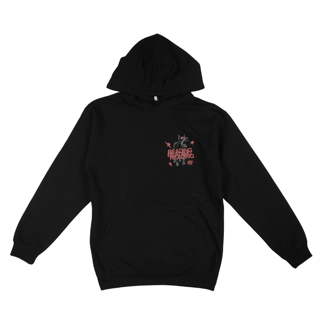 Introducing the Reading Festival Black Dog Hoodie from Reading & Leeds Festival. This black hooded sweatshirt features a front pocket and is crafted from super soft Ringspun Cotton. A small red graphic with star and abstract designs, along with text reading “READING FIGHTING,” decorates the left chest. Designed in a unisex fit for all-day comfort, the hoodie is photographed against a plain white background.