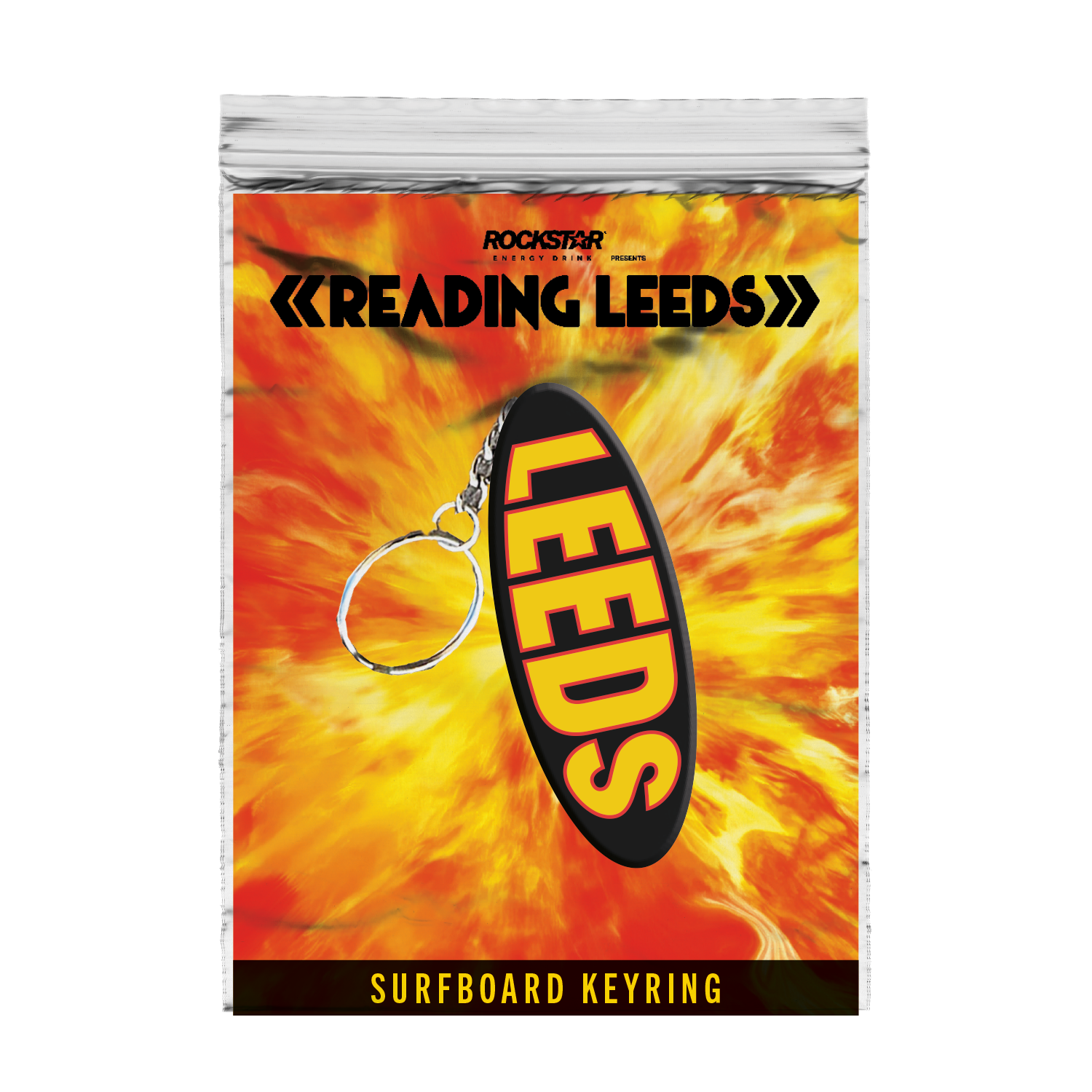The Leeds Keyring by 2025 features a surfboard shape with bold yellow LEEDS lettering on black, packaged in a plastic bag with a fiery yellow-orange background and READING LEEDS displayed at the top.