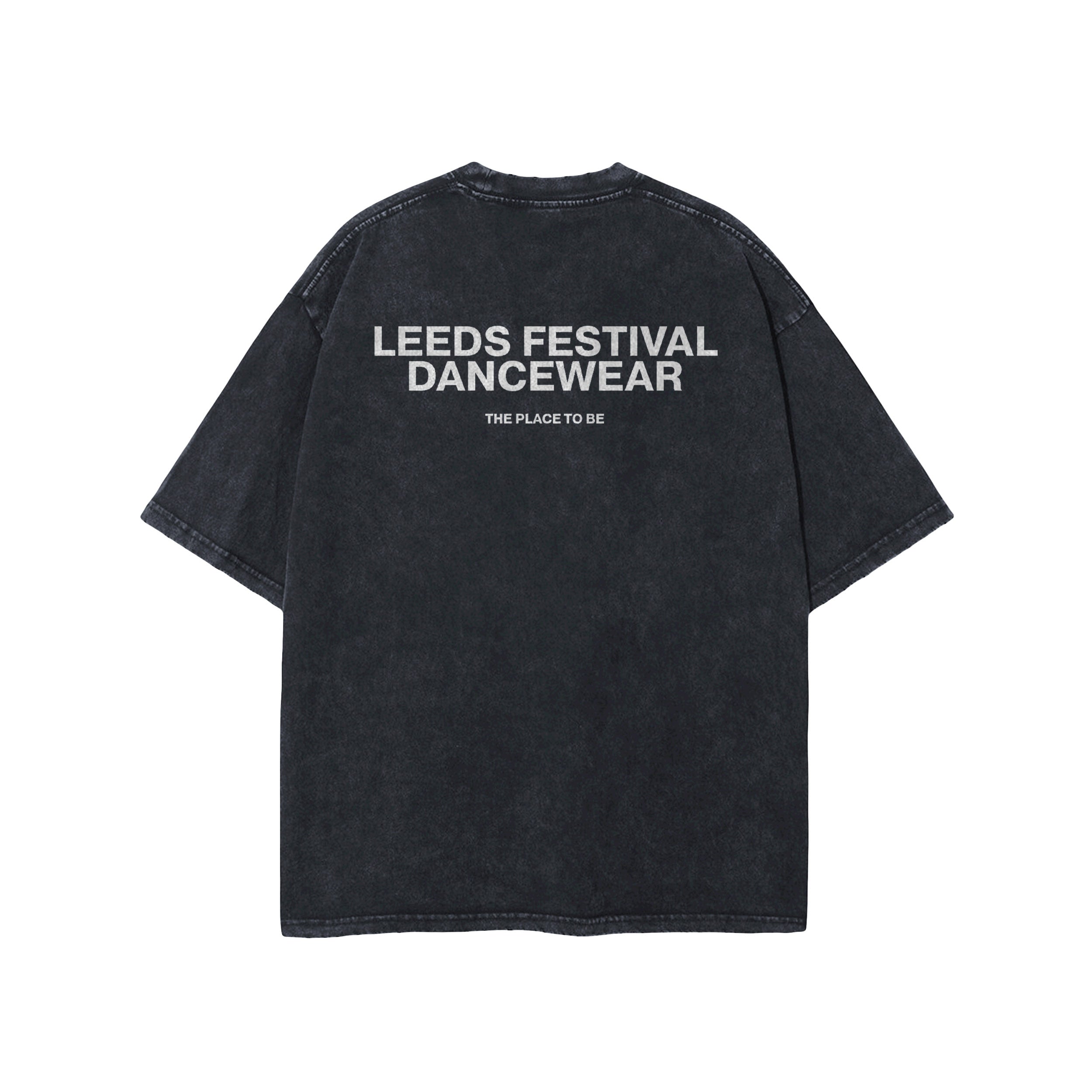 The Leeds Dancewear Oversize T-Shirt by Reading & Leeds Festival is a black oversized tee with bold LEEDS FESTIVAL DANCEWEAR on the back and THE PLACE TO BE below—ideal festival dancewear for fans.