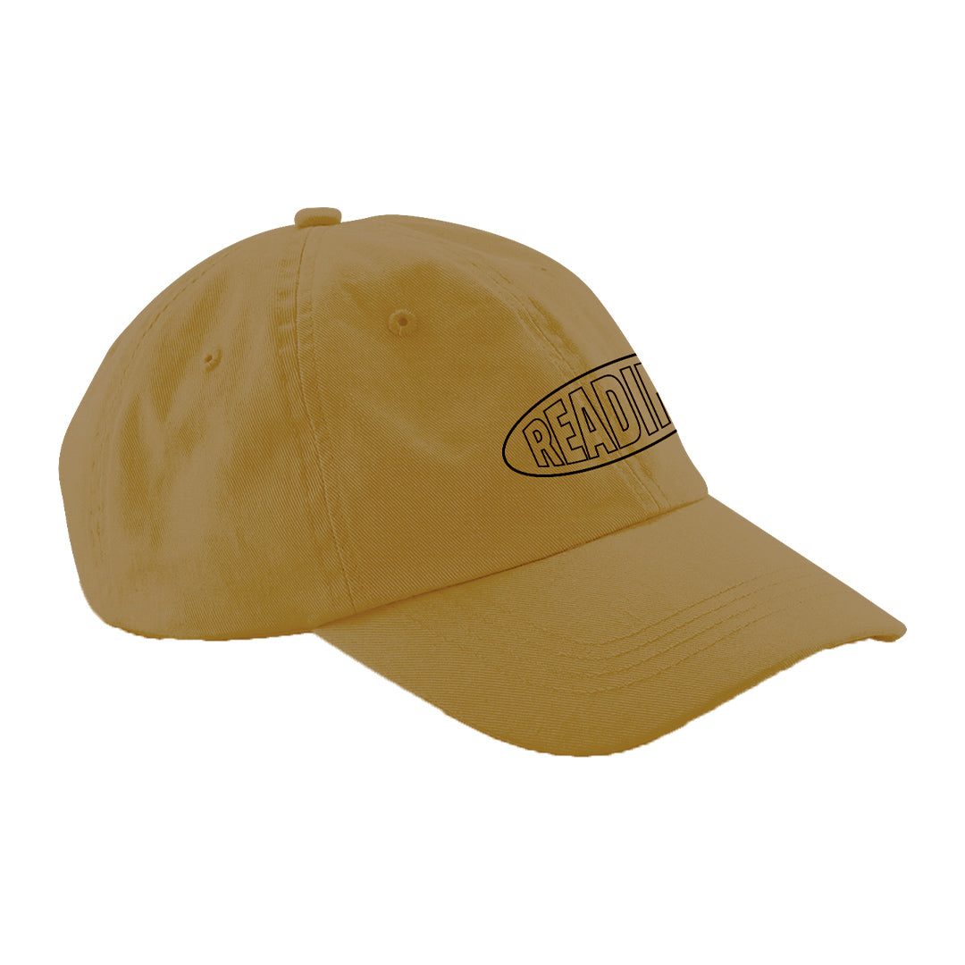 Show off your love for books with the Reading Cap from Reading & Leeds Festival—a yellow baseball cap featuring a curved brim and bold, black READING print on the front. Perfect for stylish book lovers!.