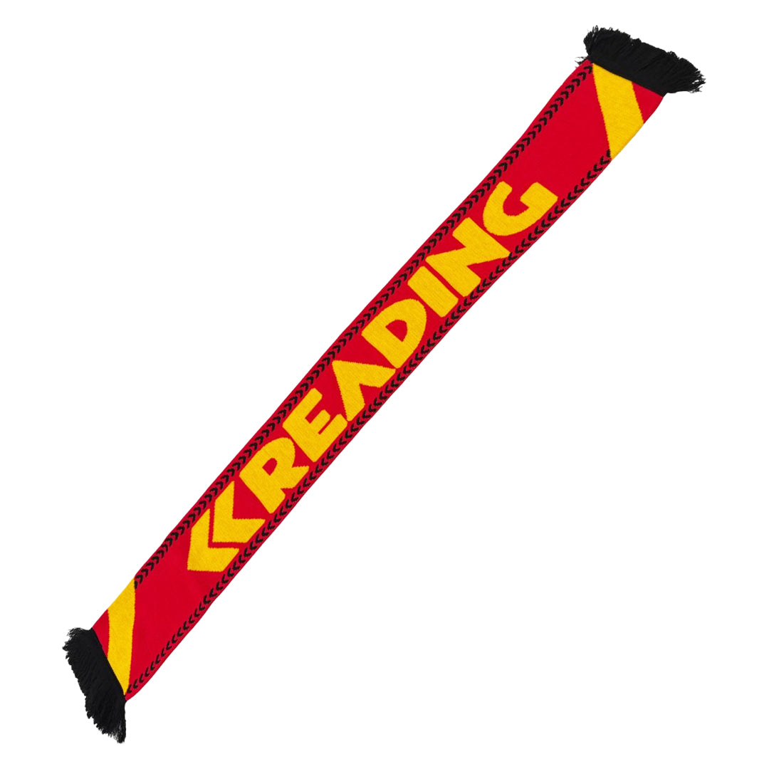 The Reading & Leeds Festival Reading Scarf is a red scarf with yellow chevron designs at each end, bold yellow READING text across the middle, and black fringe on both ends—perfect festival merchandise for fans.